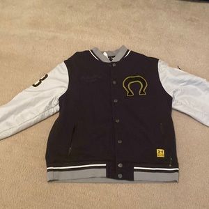 Under Armour varsity jacket. Used. Worn several times however like new.